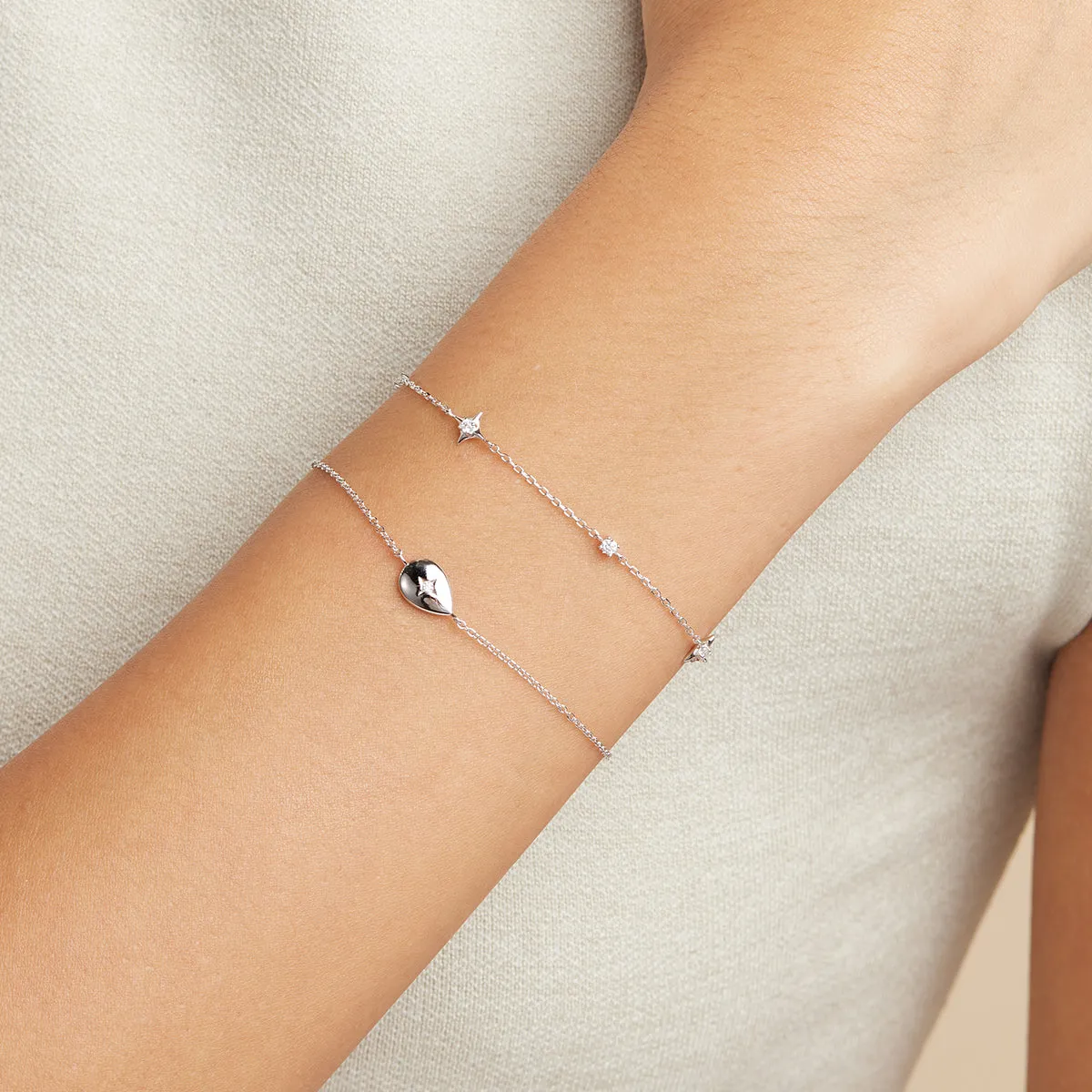 Cosmic Star Charm Bracelet in Silver