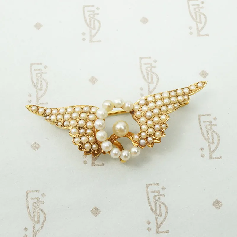 Gold Pearl Set Winged Wheel Brooch