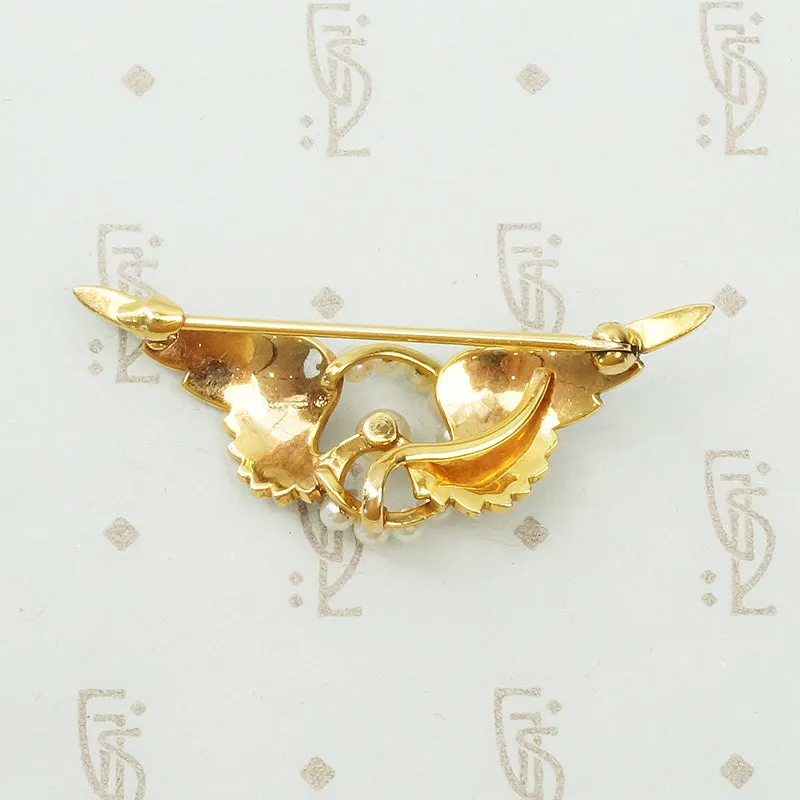 Gold Pearl Set Winged Wheel Brooch