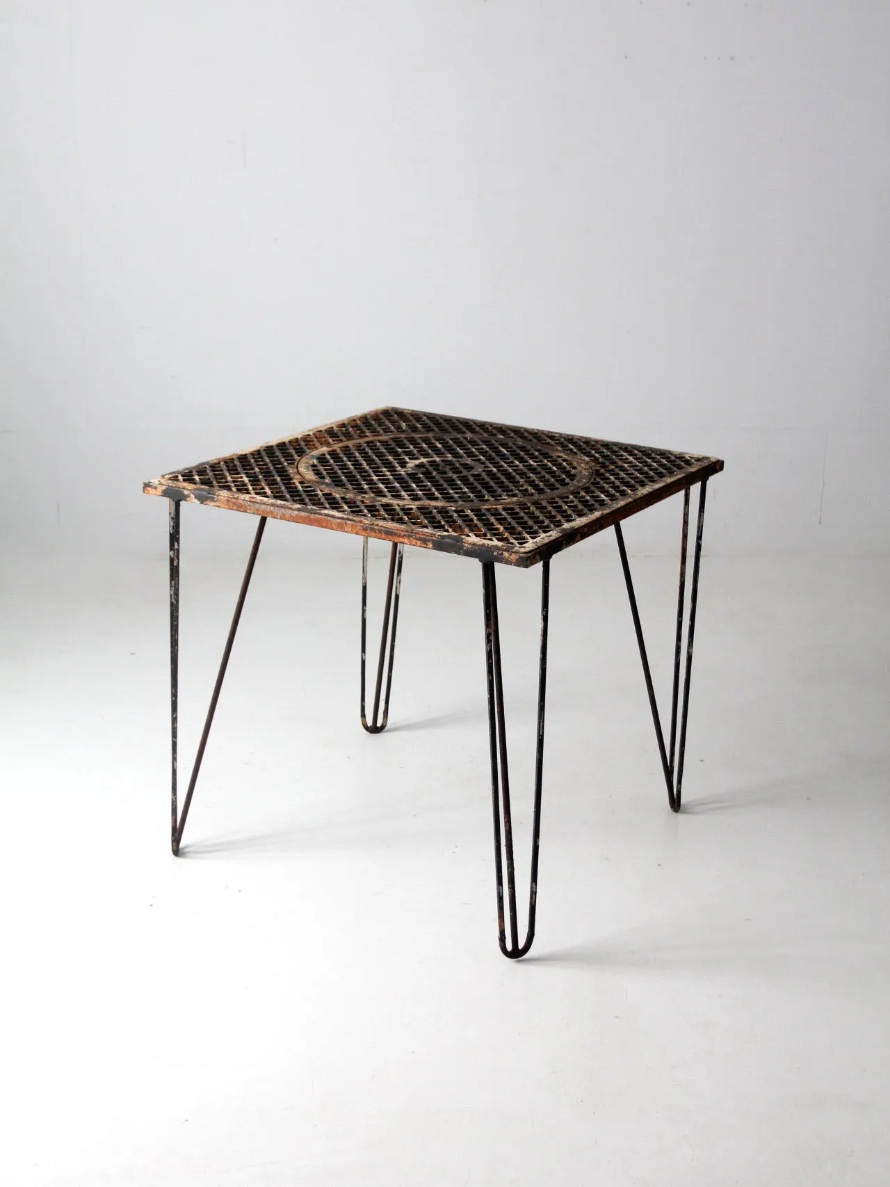 mid-century hairpin leg iron table