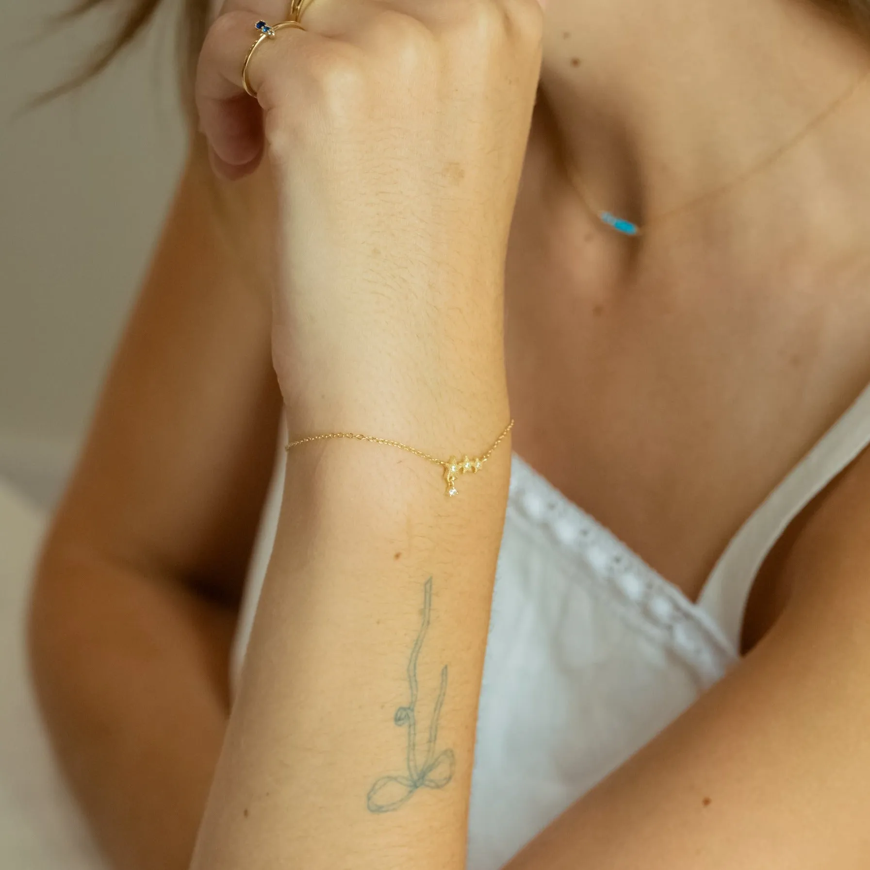 Stella Triple Stars Gold Charm Bracelet
